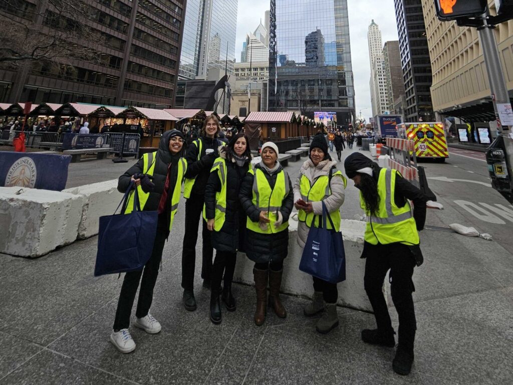 CIRR business ambassadors gather outside a public market