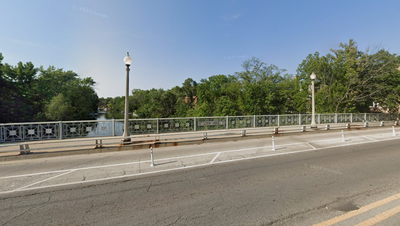 Montrose Bridge overlooking the Chicago River, with patchy asphalt