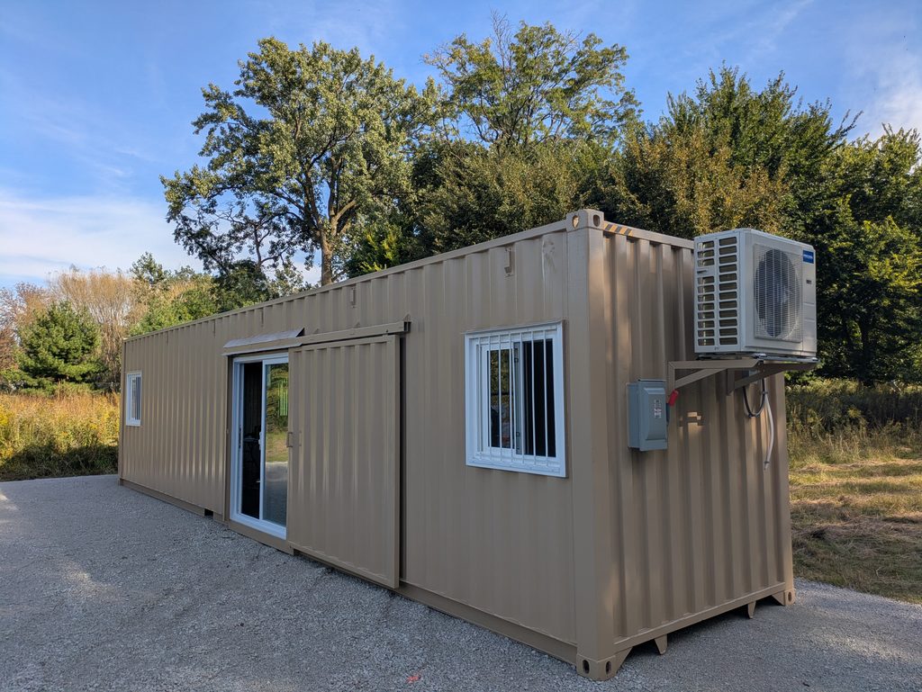 brown trailer with trees in the background